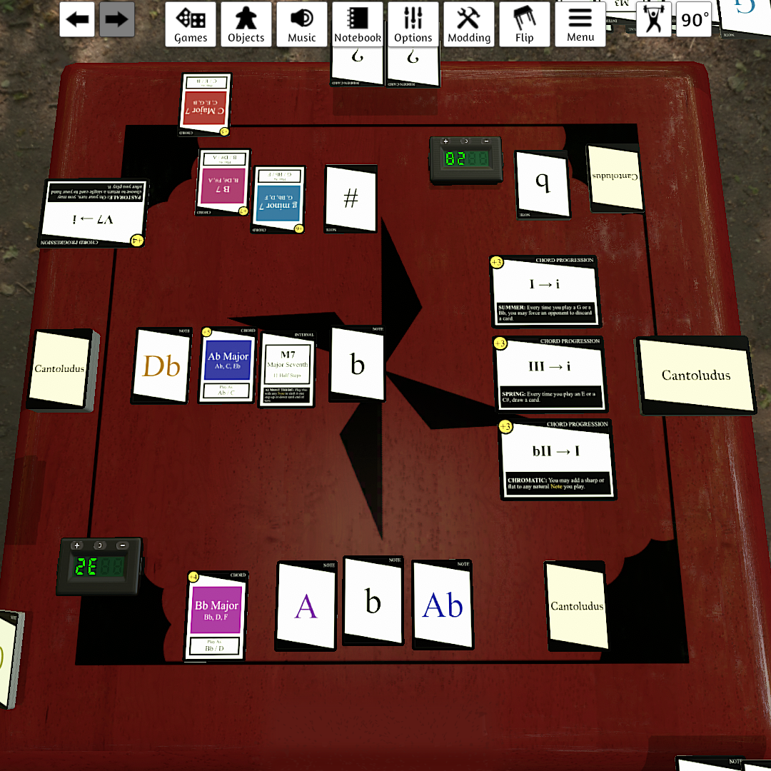 Colorful cards laid out on Tabletop Simulator, a virtual 3D tabletop.